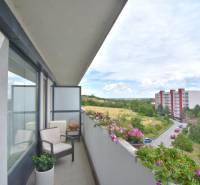 The balcony of a 4-room apartment with a view of Pri vinohradoch street in Bratislava-Rača.