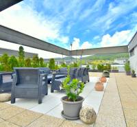 Rooftop terrace with garden furniture and a view of the surroundings in Bratislava - Rača.