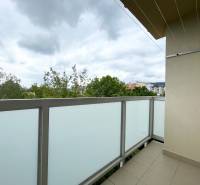 A balcony in a 2-room apartment on Centrum I street in Dubnica nad Váhom with a view of greenery.