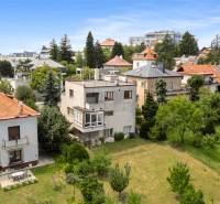 Family houses surrounded by greenery on Mudroňova Street in Bratislava - Staré Mesto.