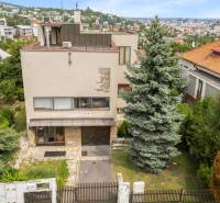 A family house on Mudroňova Street in Bratislava - Staré Mesto surrounded by greenery.