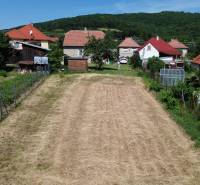 Family houses in Smolenice on Kpt. Ján Nálepka Street with a view of the gardens.