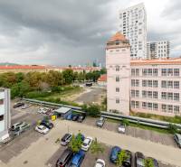 View of the parking lot and buildings in Bratislava - Ružinov on Miletičova Street.