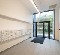 The entrance hall of the apartment building on Miletičova Street in Bratislava with mailboxes.