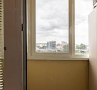 View from a 3-room apartment with a window and blinds in Bratislava - Petržalka on Gercenova Street.