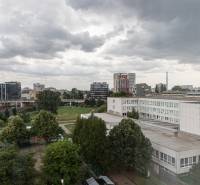 A view of the school and greenery in Bratislava - Petržalka on Gercenova Street.