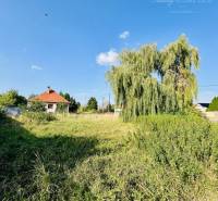 Plots - housing for sale on Moča Street in Okoč, near the house with the red roof.