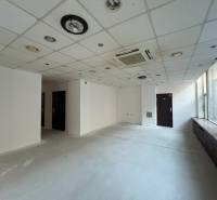 Commercial premises with white walls and ceiling panels in Bratislava - Staré Mesto.