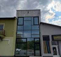 A building with a glass entrance in commercial premises in Poprad.