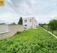 In Bratislava, there is a modern 5 or more room apartment, surrounded by a green plot.