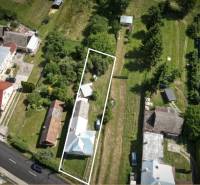 Aerial view of the garden and surroundings of a family house in the town of Konská.