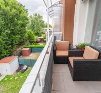 Balcony of a 2-room apartment on Agátová Street in Rovinka with a view of the garden.