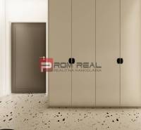 A hallway in a 3-room apartment with storage space and terrazzo flooring.