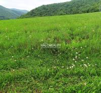 Green meadows and hills in Margecany for residential plots.
