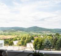 View from the window of a 3-room apartment to the hills and greenery in Pezinok, May 1st.