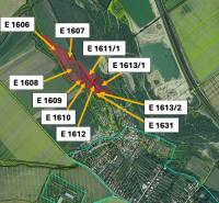 Aerial view of agricultural and forest land near the village of Ražňany with marked parcels.