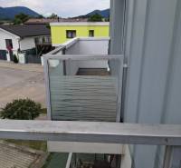View from a 4-room apartment in Martin of the surrounding houses and mountains in the background.