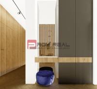 Entrance hall of a 4-room apartment with wooden paneling and a blue pouf.