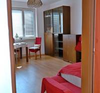 Living room in a 3-room apartment with seating and furniture, bright conditions.