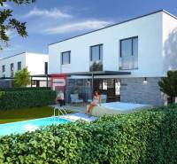 In Dubová, there are white buildings with a pool in front of 3-room apartments.