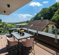 A family house balcony overlooking greenery with garden furniture (Bratislava - Ahoj, Sliačska).