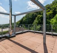 Wooden terrace on the roof of a family house on Sliačska Street, with a view of Bratislava-Ahoj.