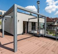 The terrace of a family house on Sliačska Street in Bratislava with a view of the city.
