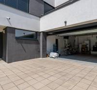 Family house on Sliačska Street in Bratislava - Ahoj with an open garage.