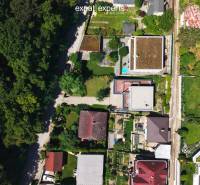 Aerial view of family houses and greenery on Sliačska Street in Bratislava - Ahoj.