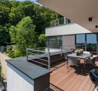The terrace of a family house on Sliačska Street in Bratislava - Ahoj with a beautiful forest view.