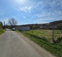 A path on the street next to the fence, ideal for plots and living in Krajné.