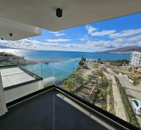 Balcony of a holiday apartment in Sarandë with a view of the sea and coastal landscape.