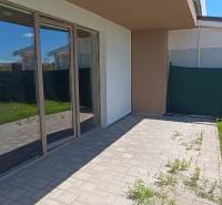 Terrace at a 2-room apartment on Veterná, Galanta with tiles and grass.