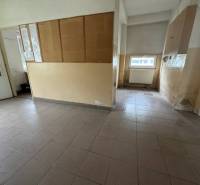 Commercial premises with tiles and glass doors.