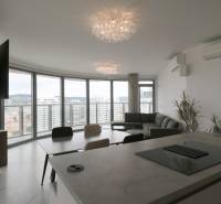 Living room with windows, dining table, sofa, and view, 3-room apartment.