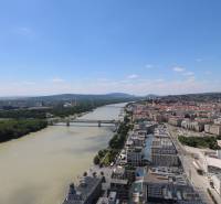 View of the Danube River and buildings in Bratislava - Old Town from Pribinova Street.