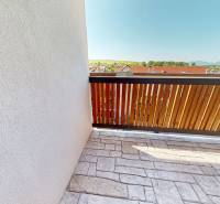 Balcony of a 2-room apartment in Demänovská Dolina with a view of the natural scenery.