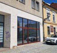 Commercial premises on Konventná Street, Bratislava - Old Town near a parked car.
