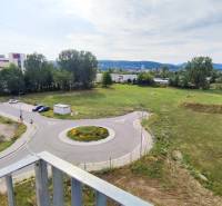 View of the intersection and greenery from Odevná Street in Trenčín.