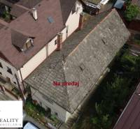Family house for sale on Bod Bánošom Street in Banská Bystrica surrounded by greenery.