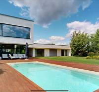 A family house on Longobardská Street in Bratislava-Rusovce with a swimming pool and a garden.