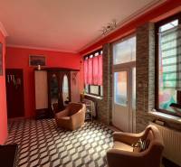 Interior of a family house with striking walls and geometric flooring.