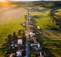 Countryside with houses and a road at sunset, Dolná Strehová, Main Street.