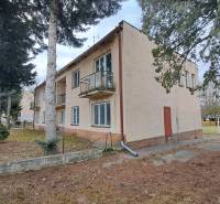A building surrounded by trees on Main Street in Dolná Strehová near hotels and guesthouses.