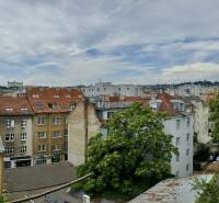 A view of the rooftops and greenery in Bratislava, Old Town on Špitálska Street.
