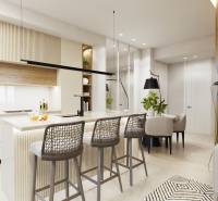 A kitchen with a dining table and a bar counter in a 3-room apartment.