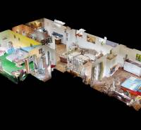 Digital layout model of rooms in a family house including furniture.
