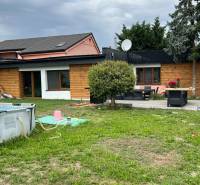 A family house on Poľná Street in Most pri Bratislave with a swimming pool and garden.