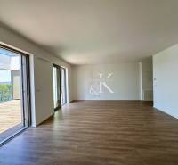 A spacious room with access to the terrace in a 3-room apartment.