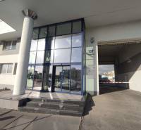 Glass entrance to offices on Vajnorská in Bratislava - Nové Mesto, with two steps.